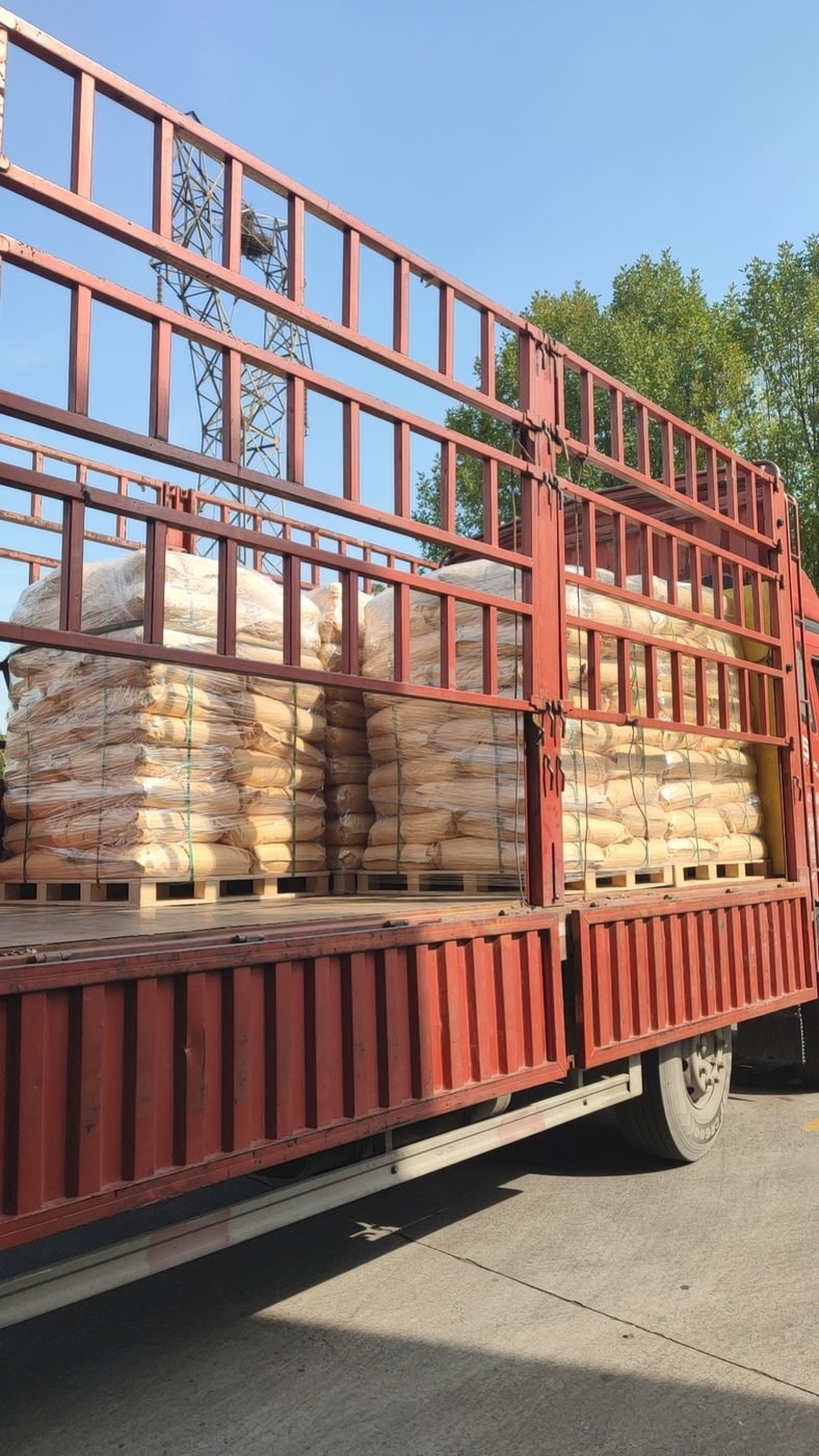 Bulk shipment of water treatment chemical bags on a truck